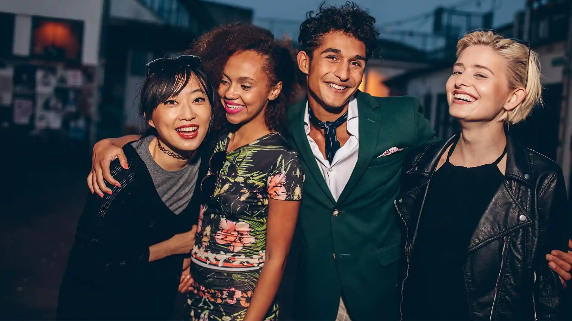 A diverse group of young friends enjoying a night out, symbolizing the vibrant social life while living in Berlin as a foreigner