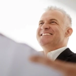a middle aged man being portrait as a professional, the opposite of Poor Work Ethic in Germany