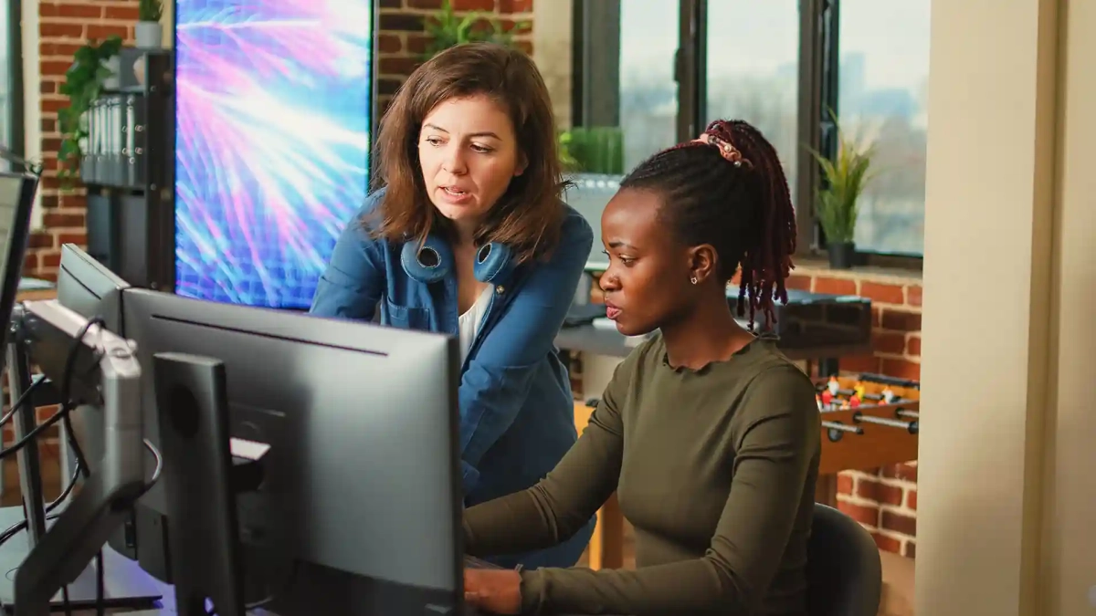 a German mature woman is showing an African young lady How to Find Ausbildung Courses in Germany