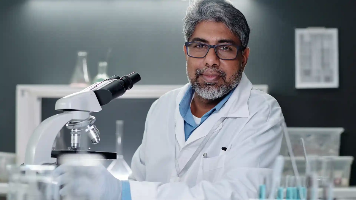 Indian skilled worker in a laboratory representing work in Germany