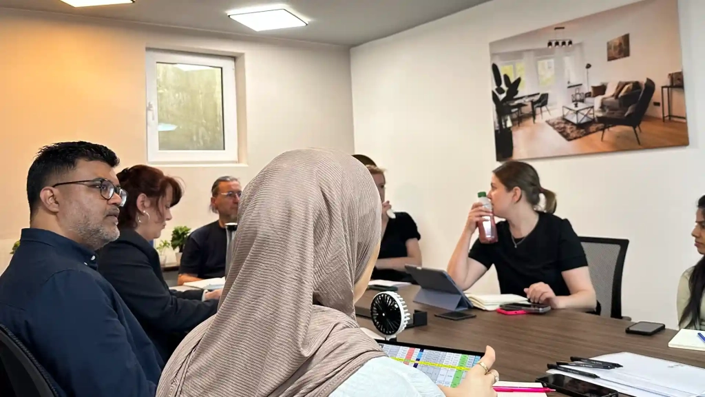 German Work Culture Shock 1 Sunit in a team meeting in Berlin showing real experiences of German Work Culture Shock