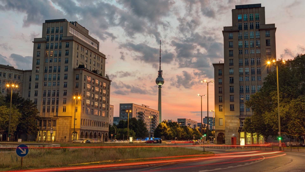 Strausberger Platz in Berlin after sunset, representing cost of living in Berlin for expats